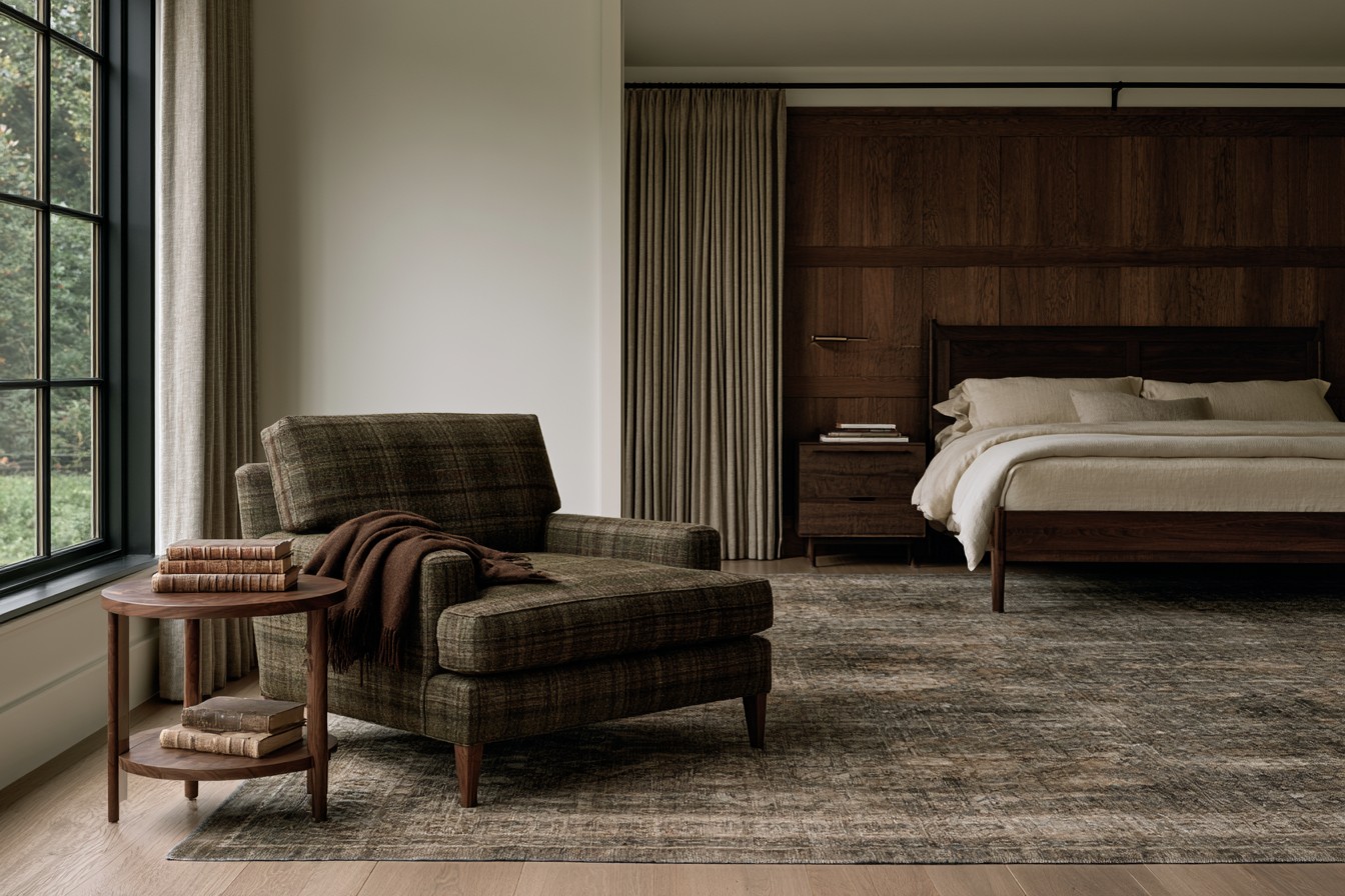 Comfortable reading chair and lamp in a classic bedroom corner