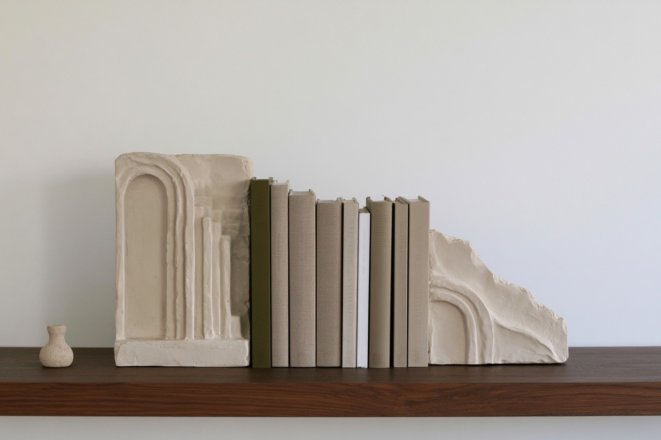 7. Abstract Carved Plaster Bookends