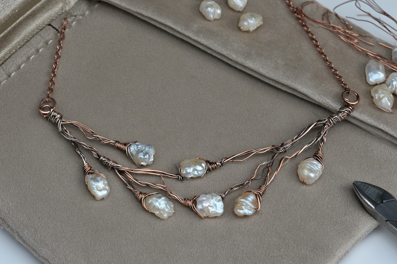 9. Delicate Pearl Branch Necklace