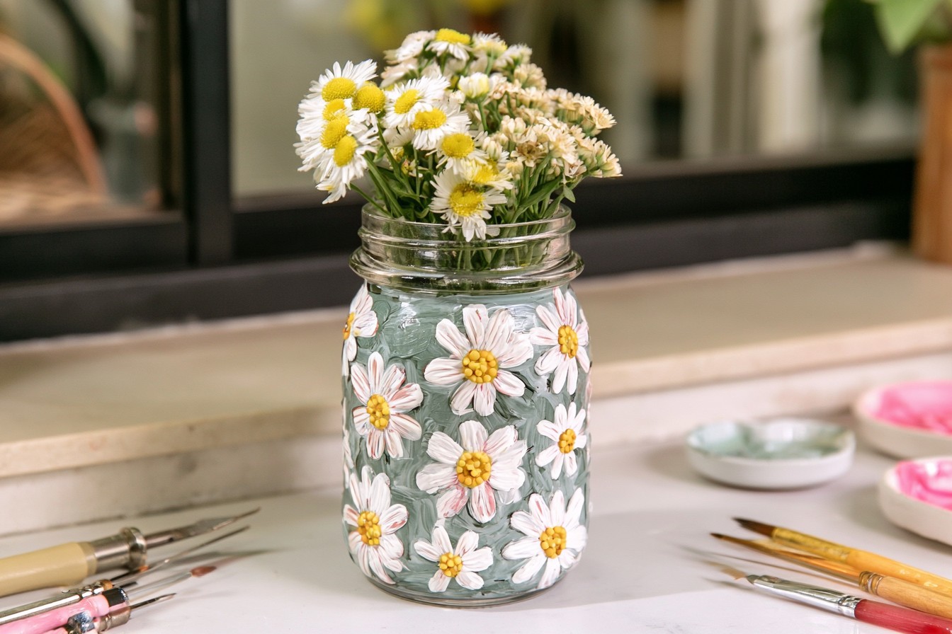 4. Cheerful Daisy Painted Jar