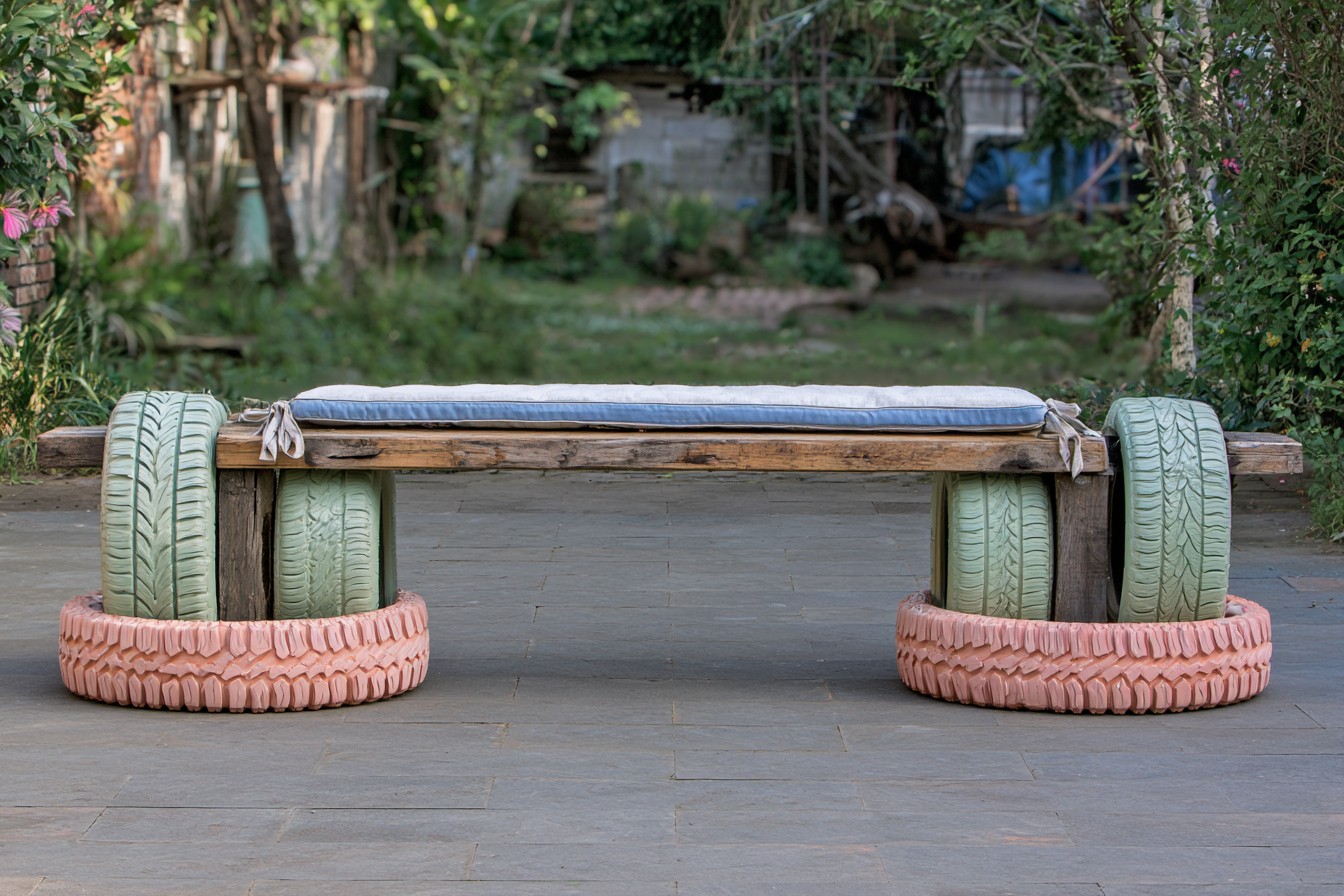 3. Bridge Two Tires Into A Garden Bench