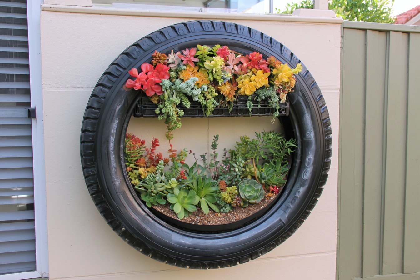 6. Display Succulents In A Vertical Tire Frame