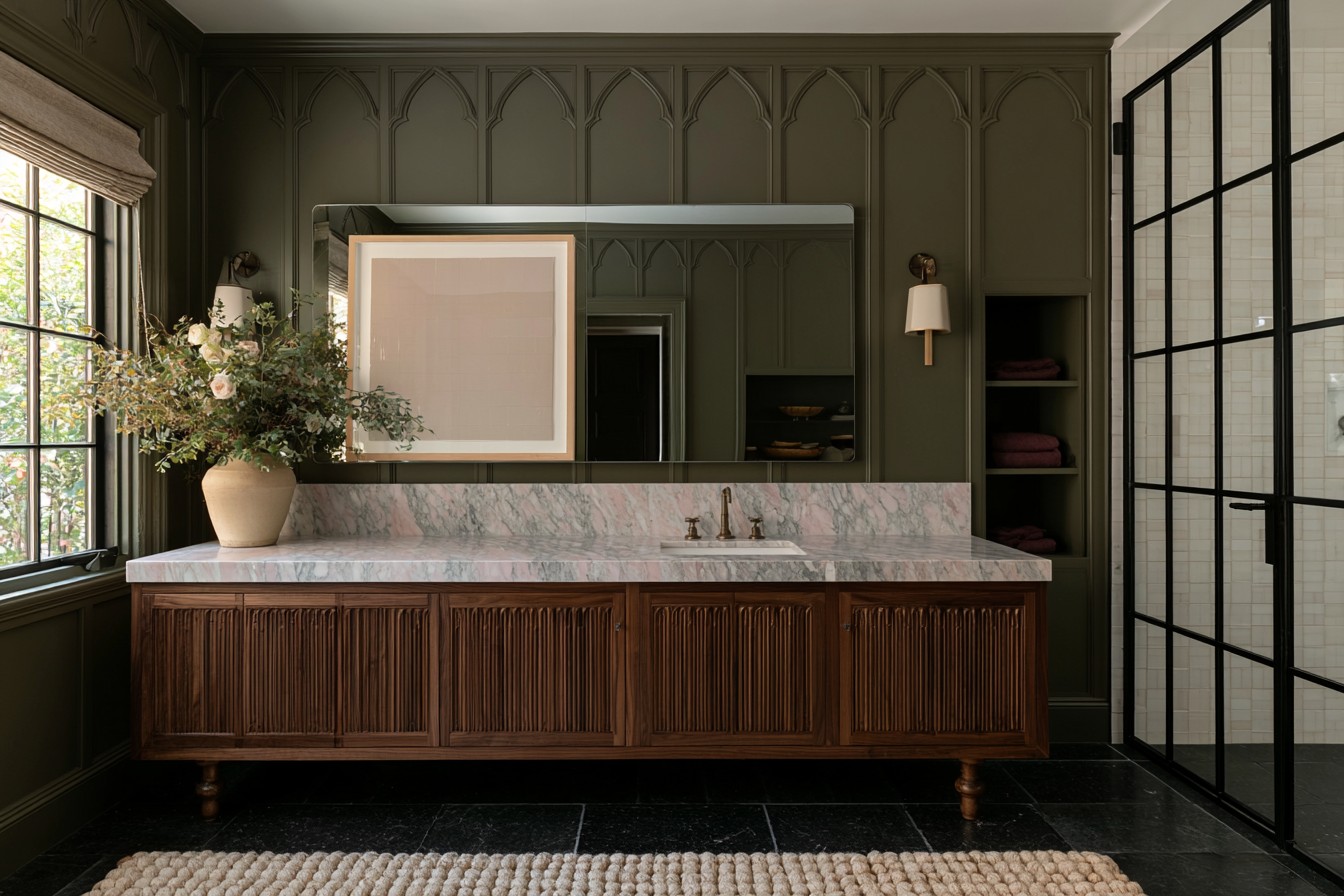 Forest green Gothic bathroom with dark wood and aged metal details