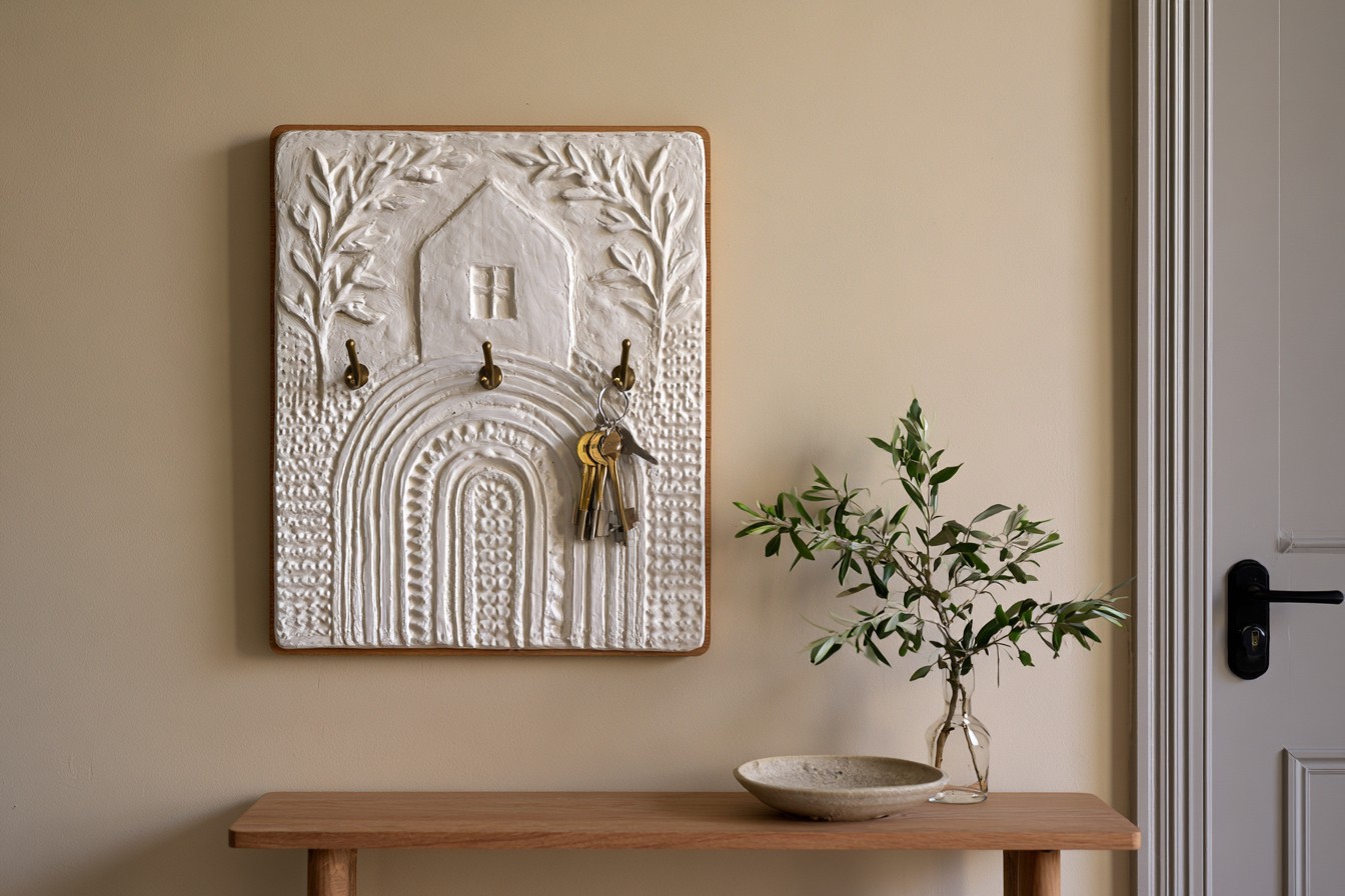 9. Carved Plaster Key Holder Panel