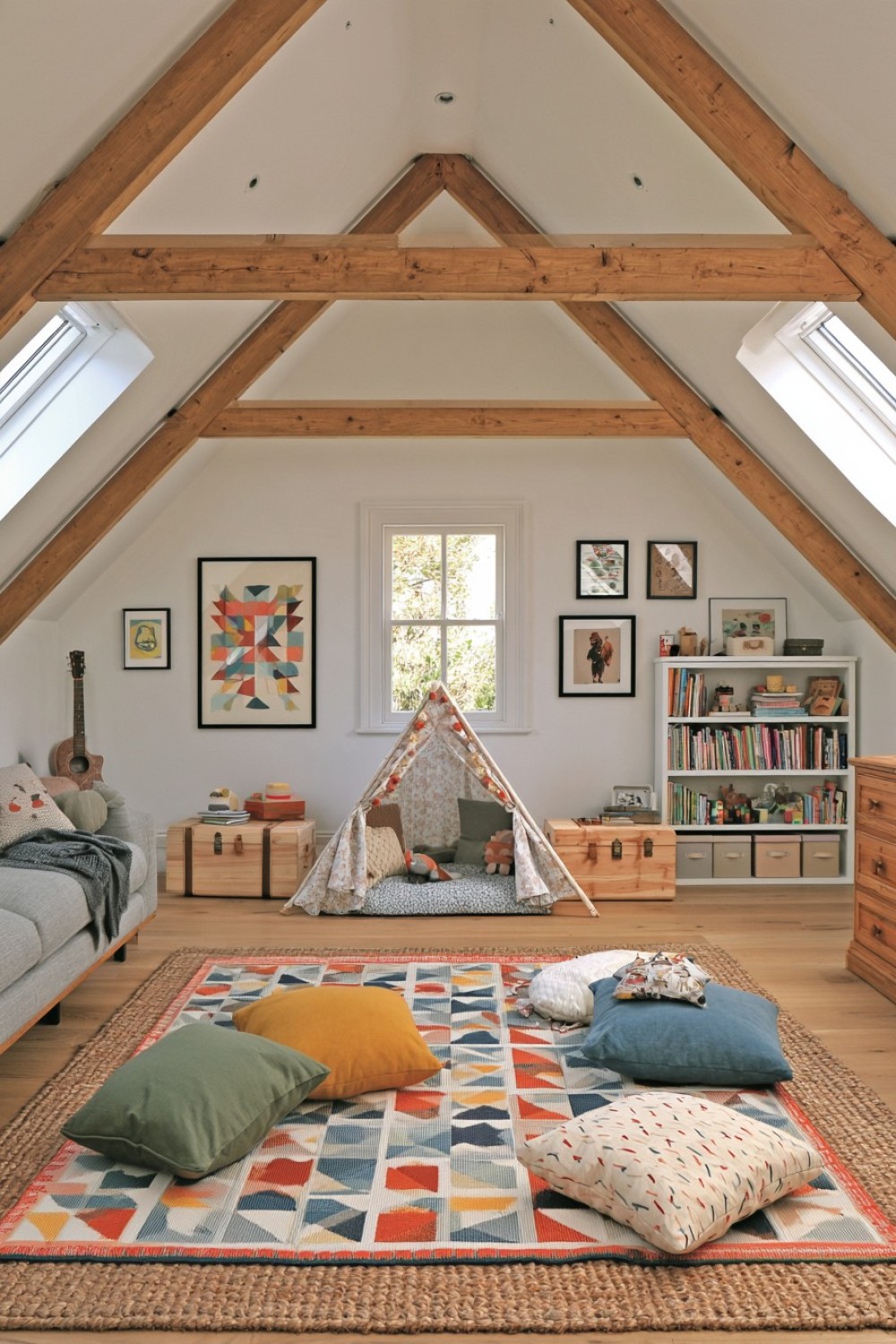 Attic beams incorporated visually into a storybook playroom theme