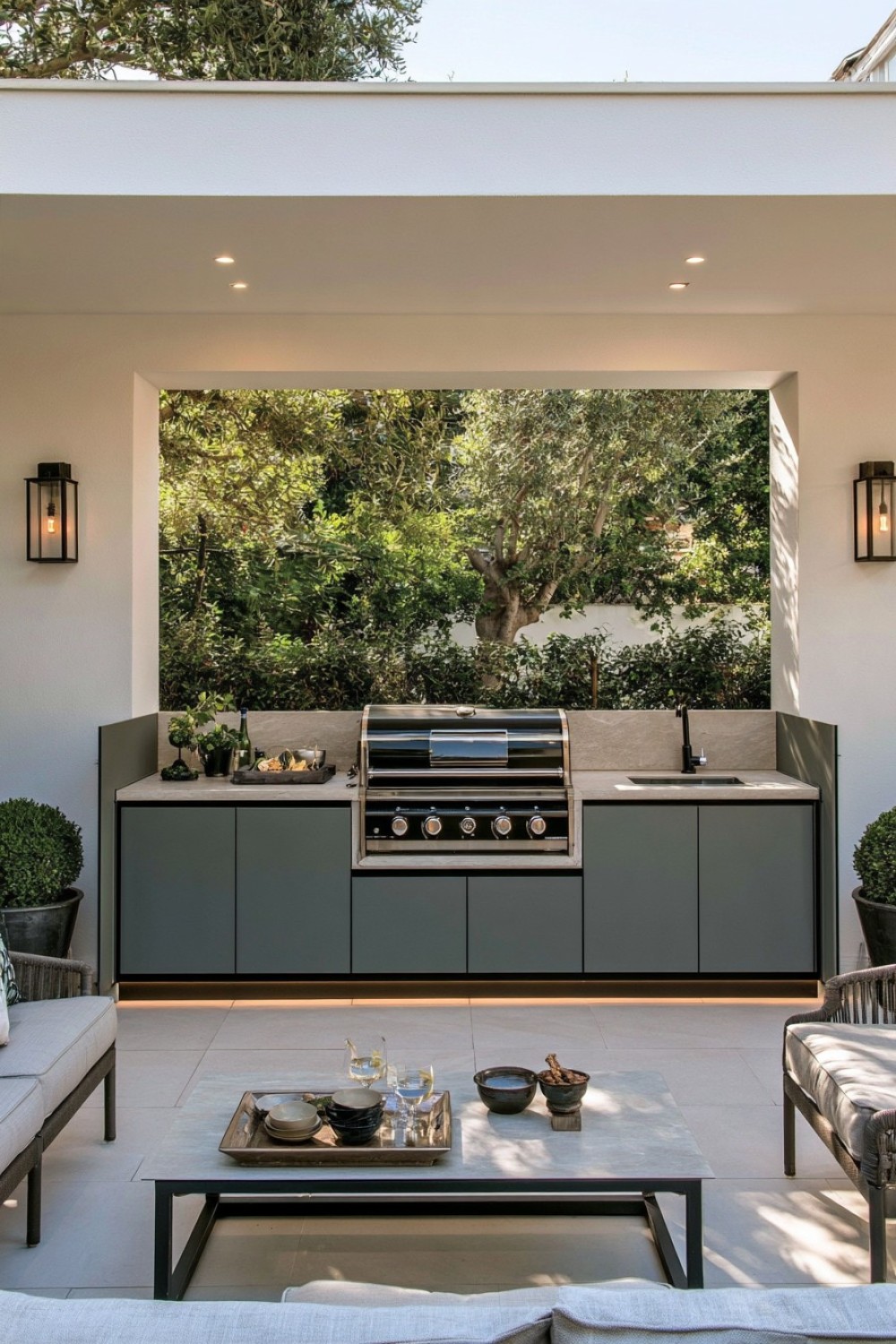 Fold-down serving counter attached to a compact outdoor kitchen