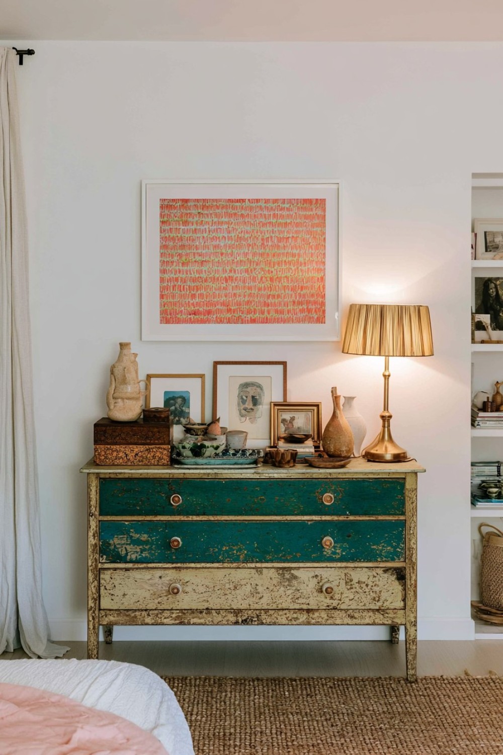 Curated vintage objects displayed in an eclectic bedroom