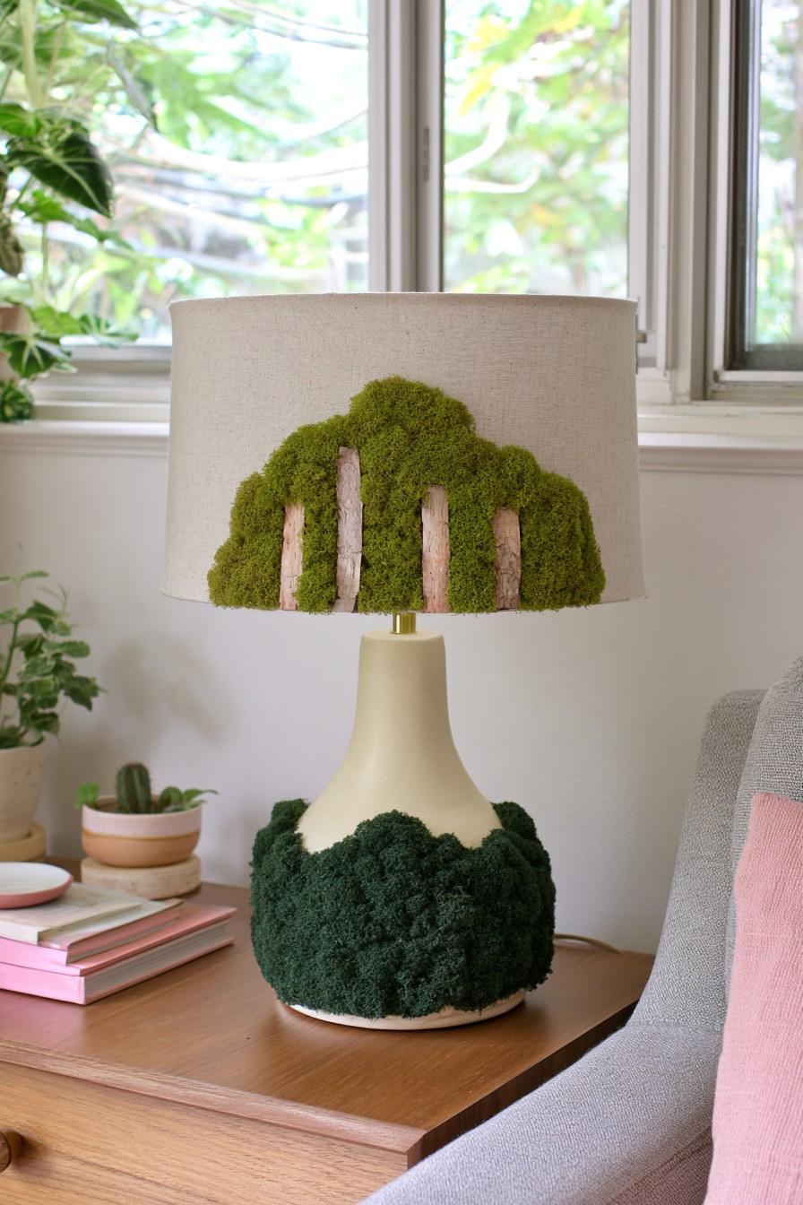 Table lamp styled with preserved moss and woodland inspired details