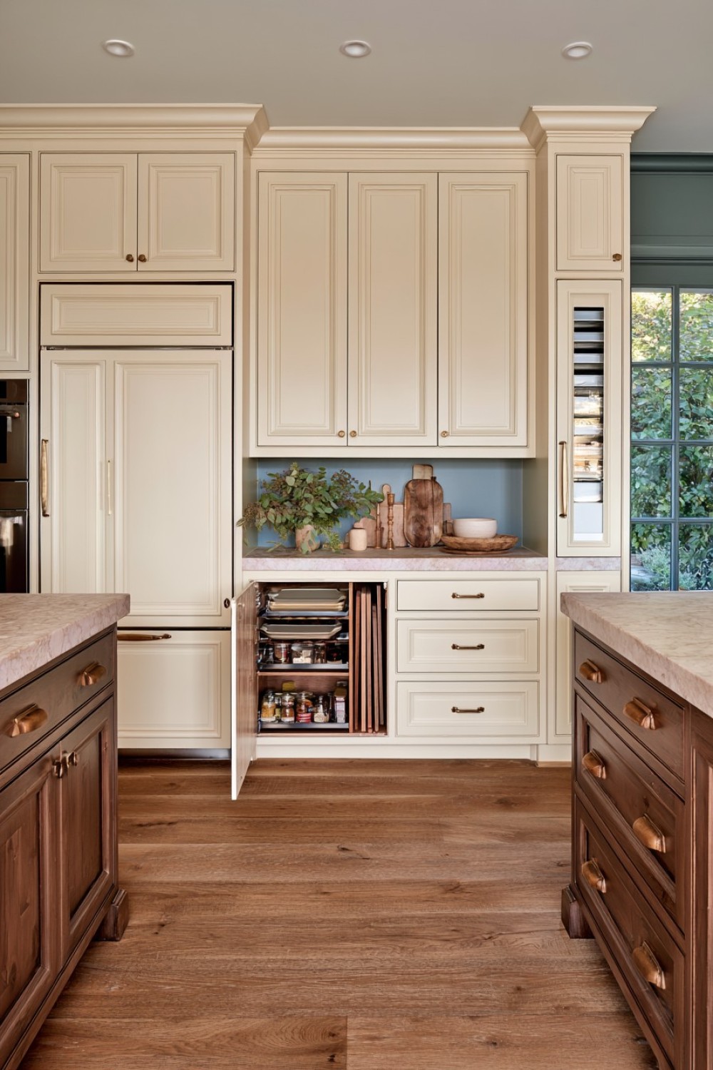 Slim vertical kitchen cabinet fitted into a narrow gap