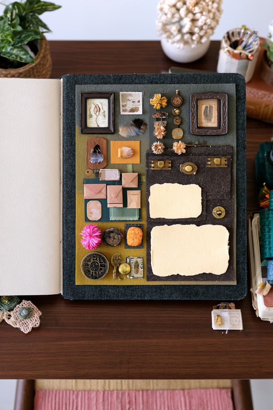 Curated vintage ephemera with mini frames and metal details