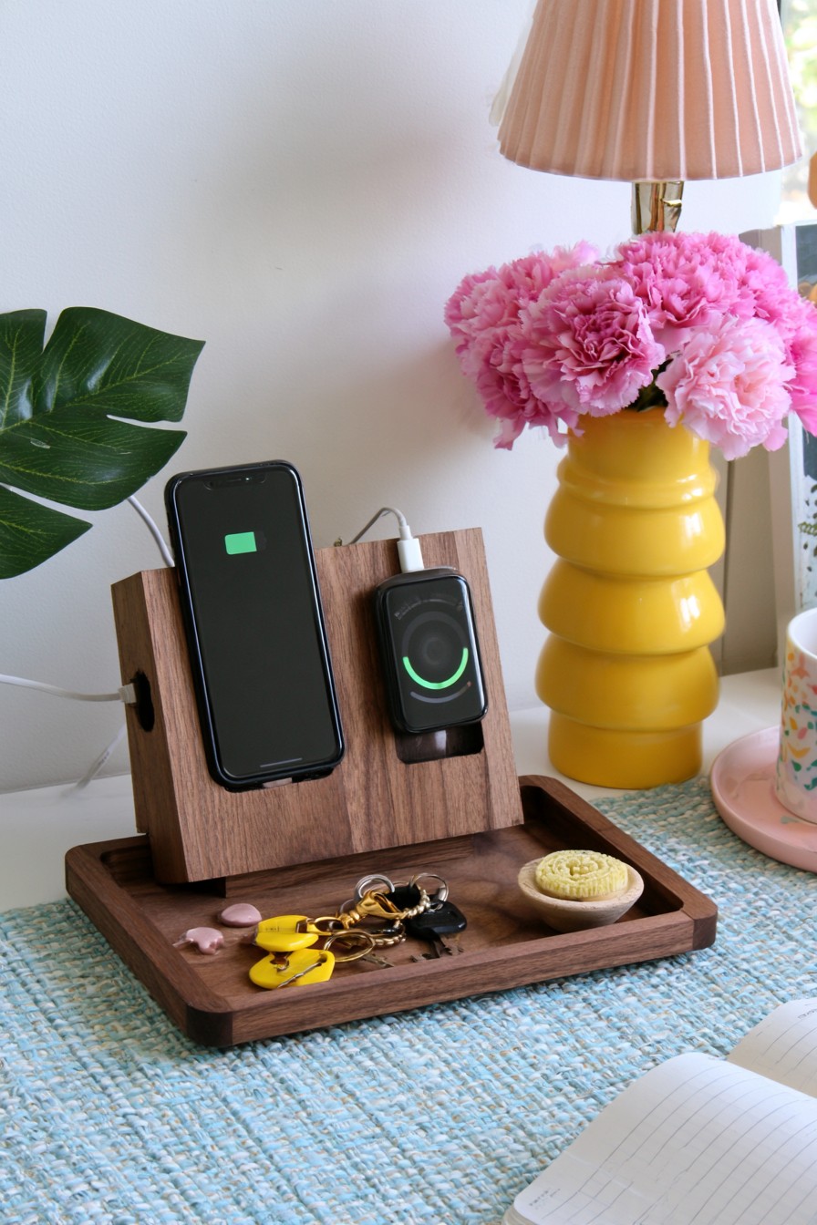 Wooden charging station with phone support and a valet tray