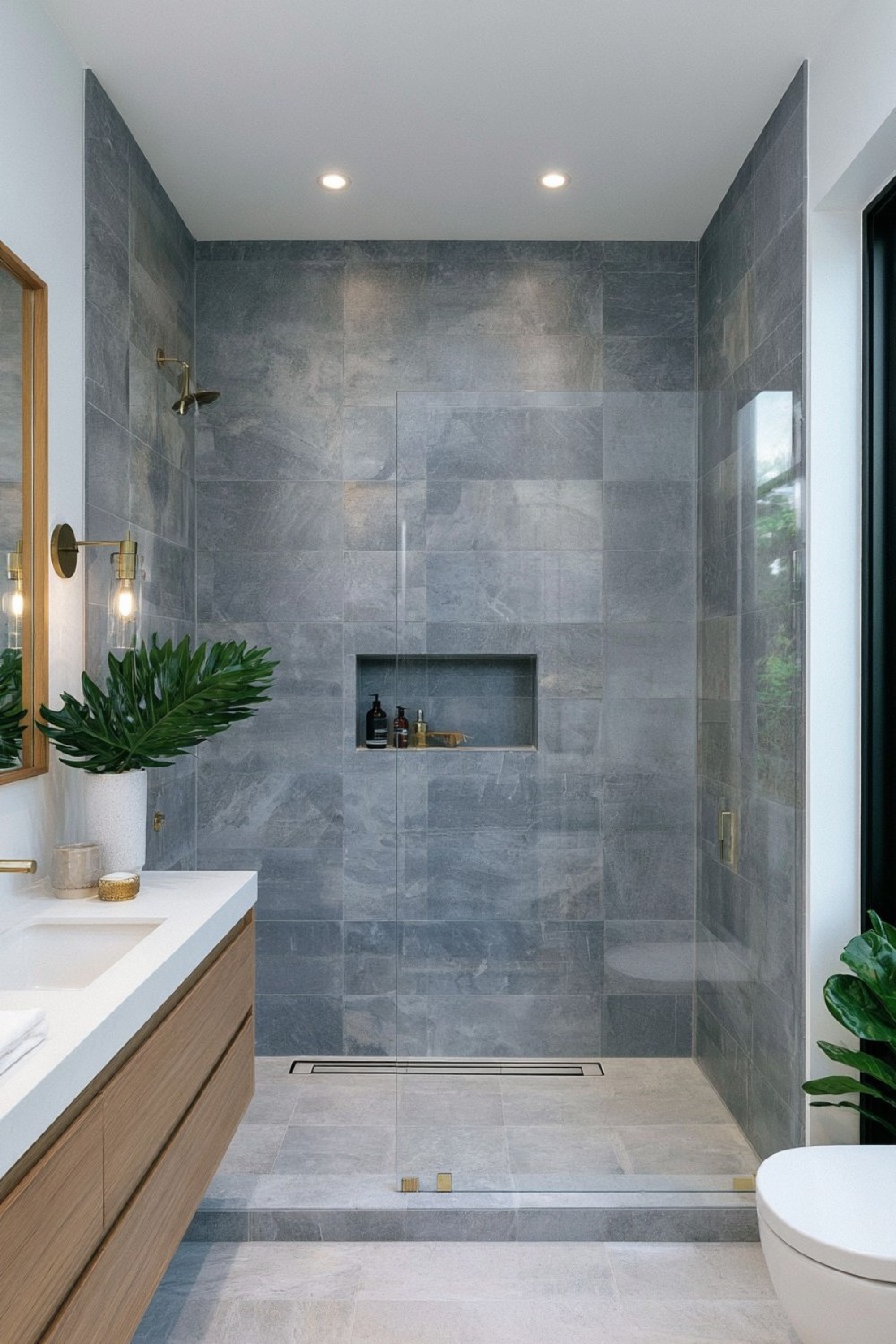 Small bathroom with a continuous walk-in shower zone