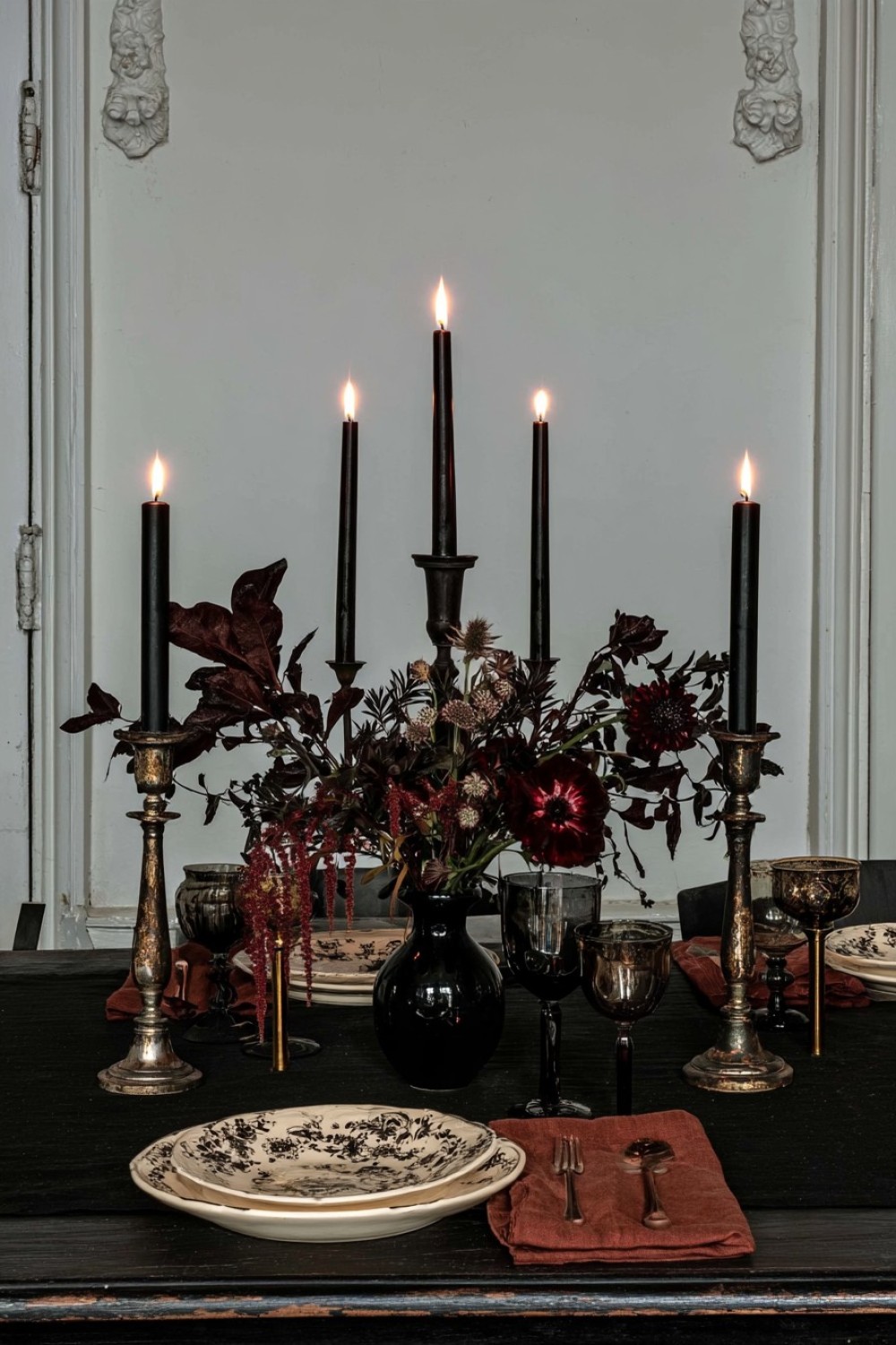 11. Dark Botanical Table With Minimal Flowers