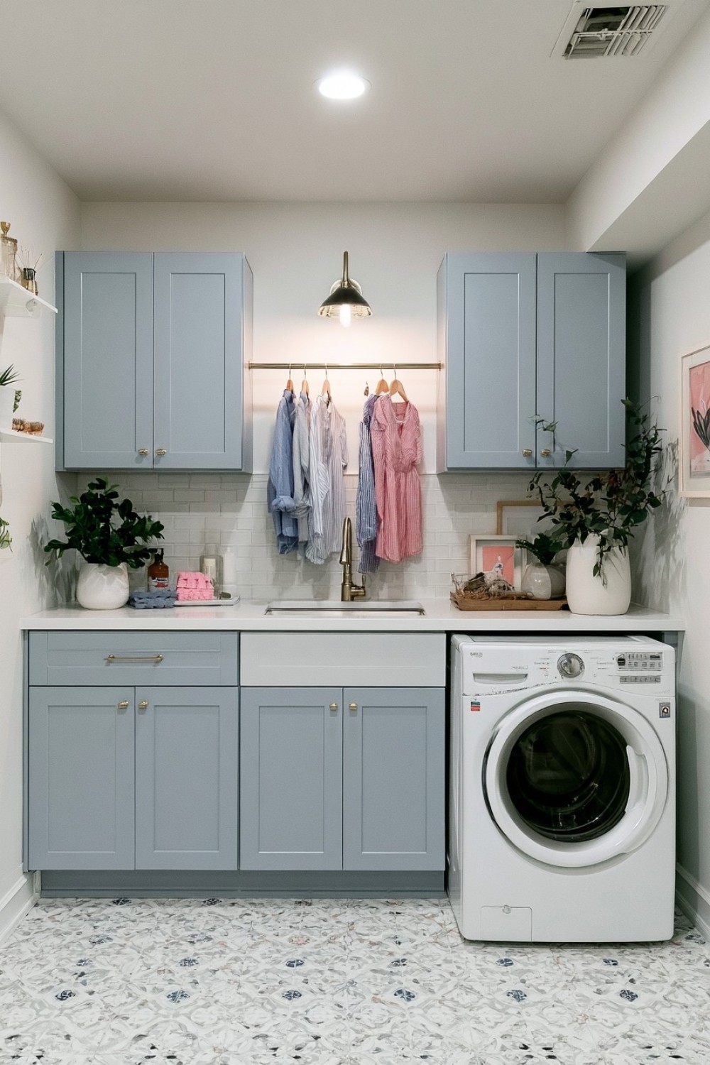 Basement laundry hanging rail fitted between upper cabinets