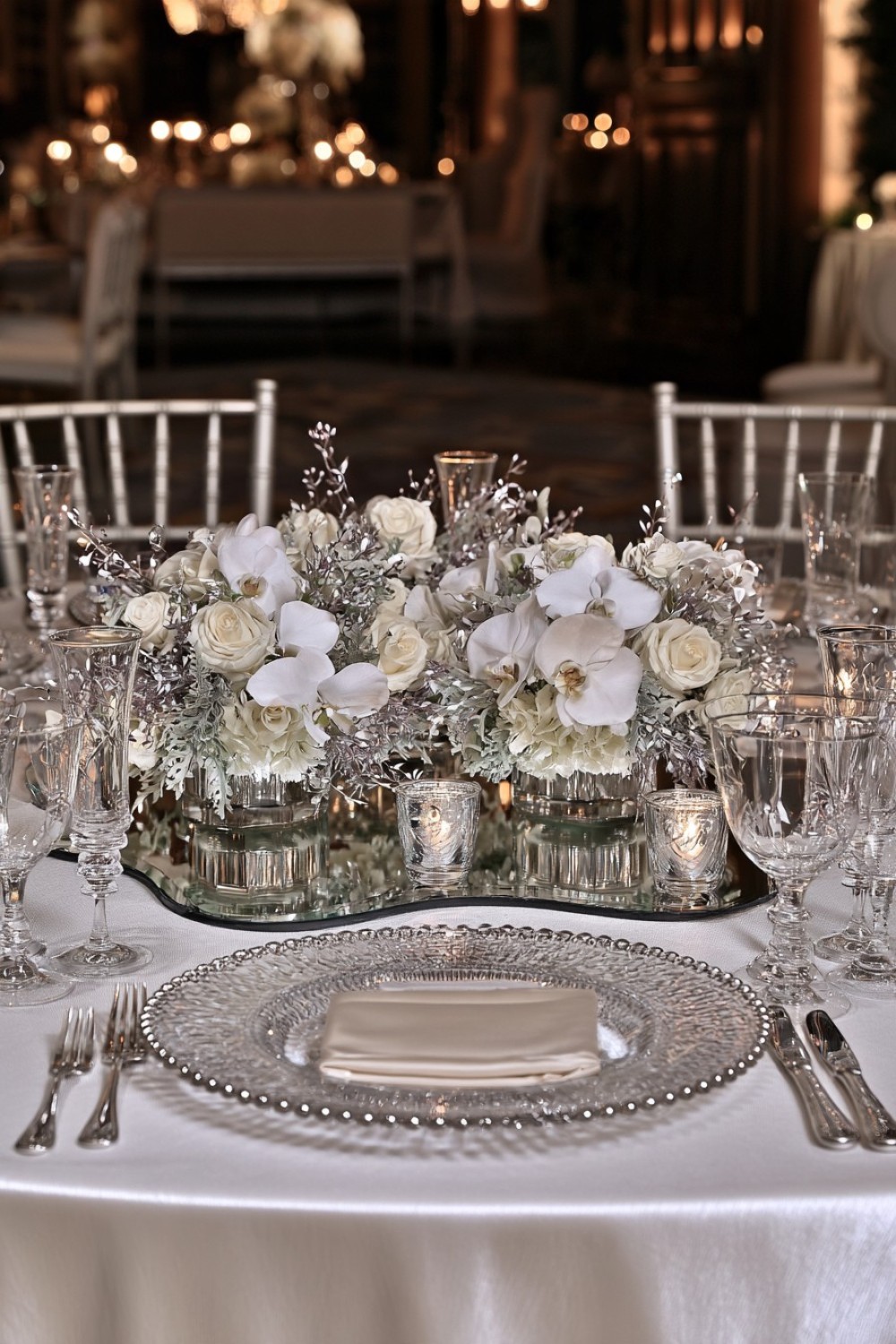 4. Mirrored Floral Islands For Reception Tables