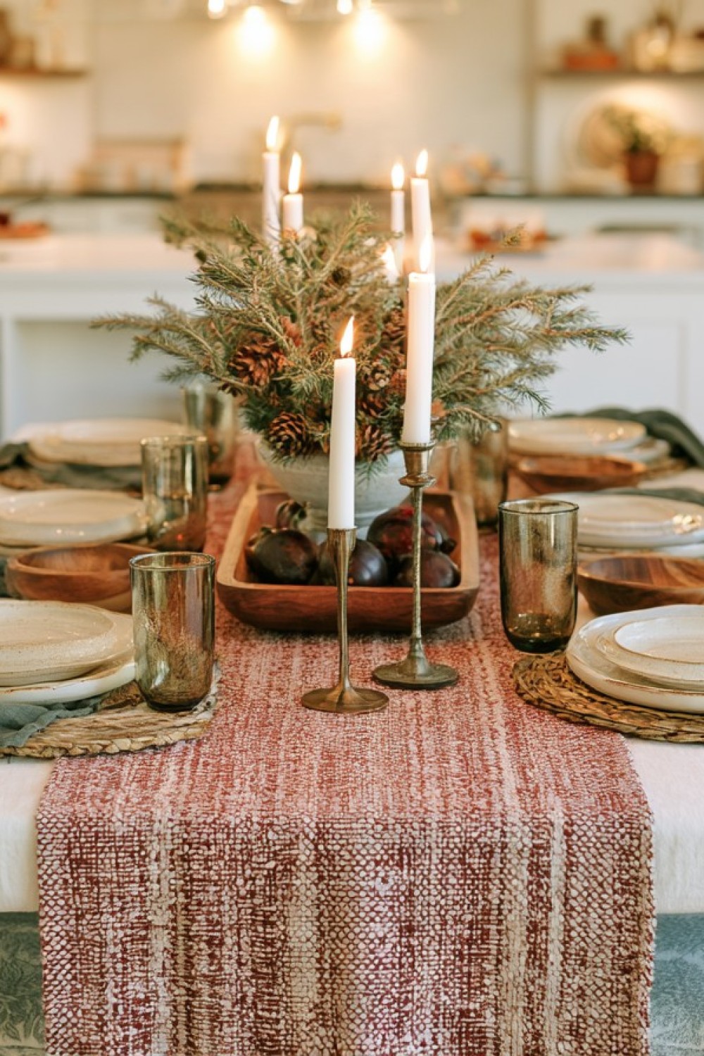 Winter dining table layered with a runner and textured napkins