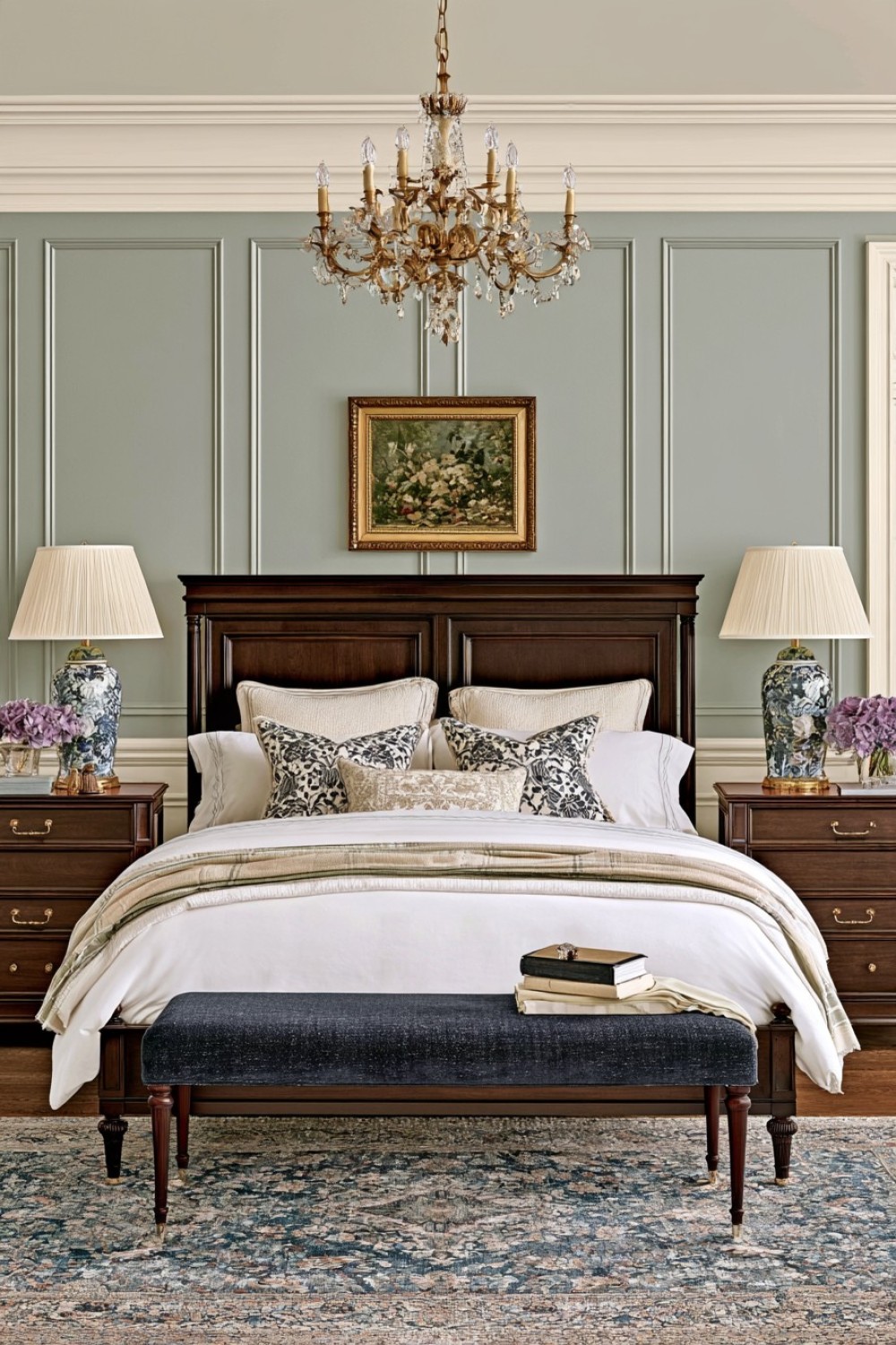 Traditional wall molding framing the bed in a Southern bedroom
