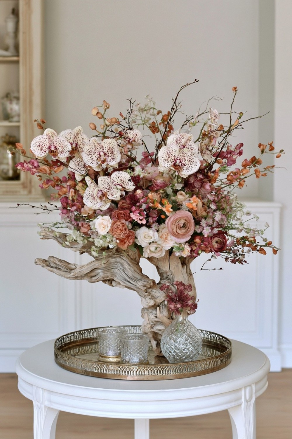 9. Build A Floral Arrangement Around A Piece Of Driftwood