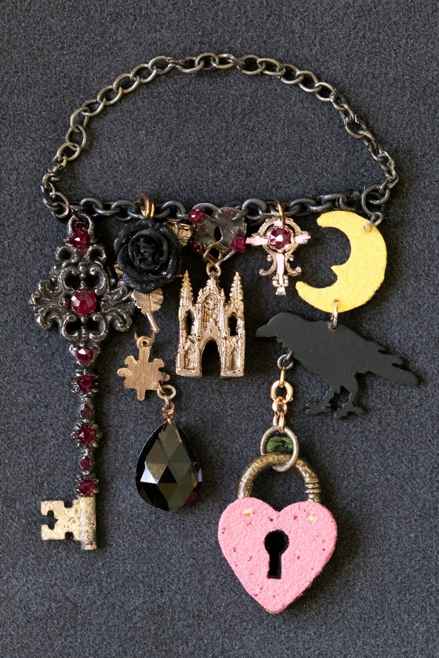 Gothic romance charm bracelet with raven rose moon cathedral and heart lock