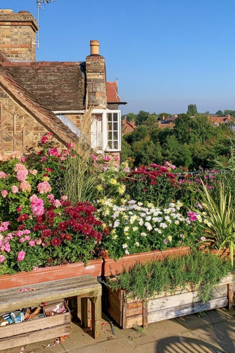 Changing seasonal flowers arranged in reusable balcony planters