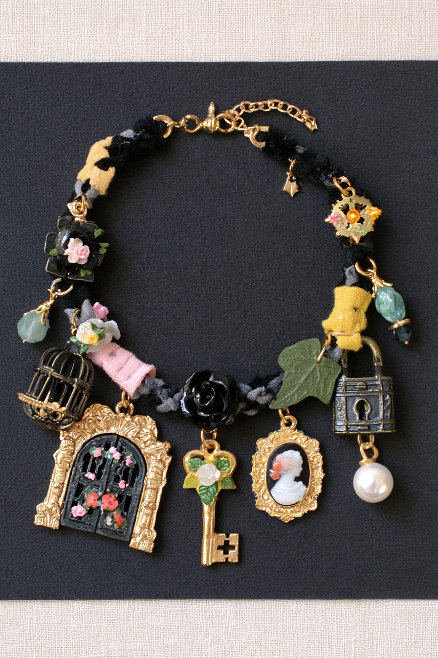 Victorian secret garden charm bracelet with key lock cameo birdcage rose ivy and gate