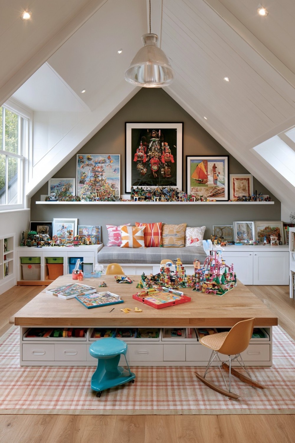 Attic building-block studio with low tables and display shelves