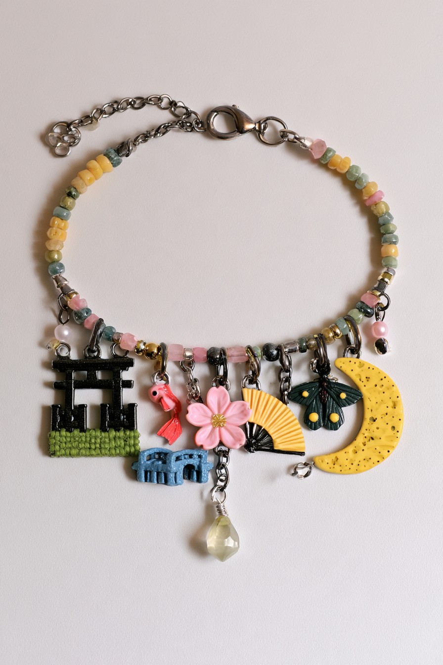Sakura inspired bracelet with cherry blossom koi torii fan moon and bridge motifs