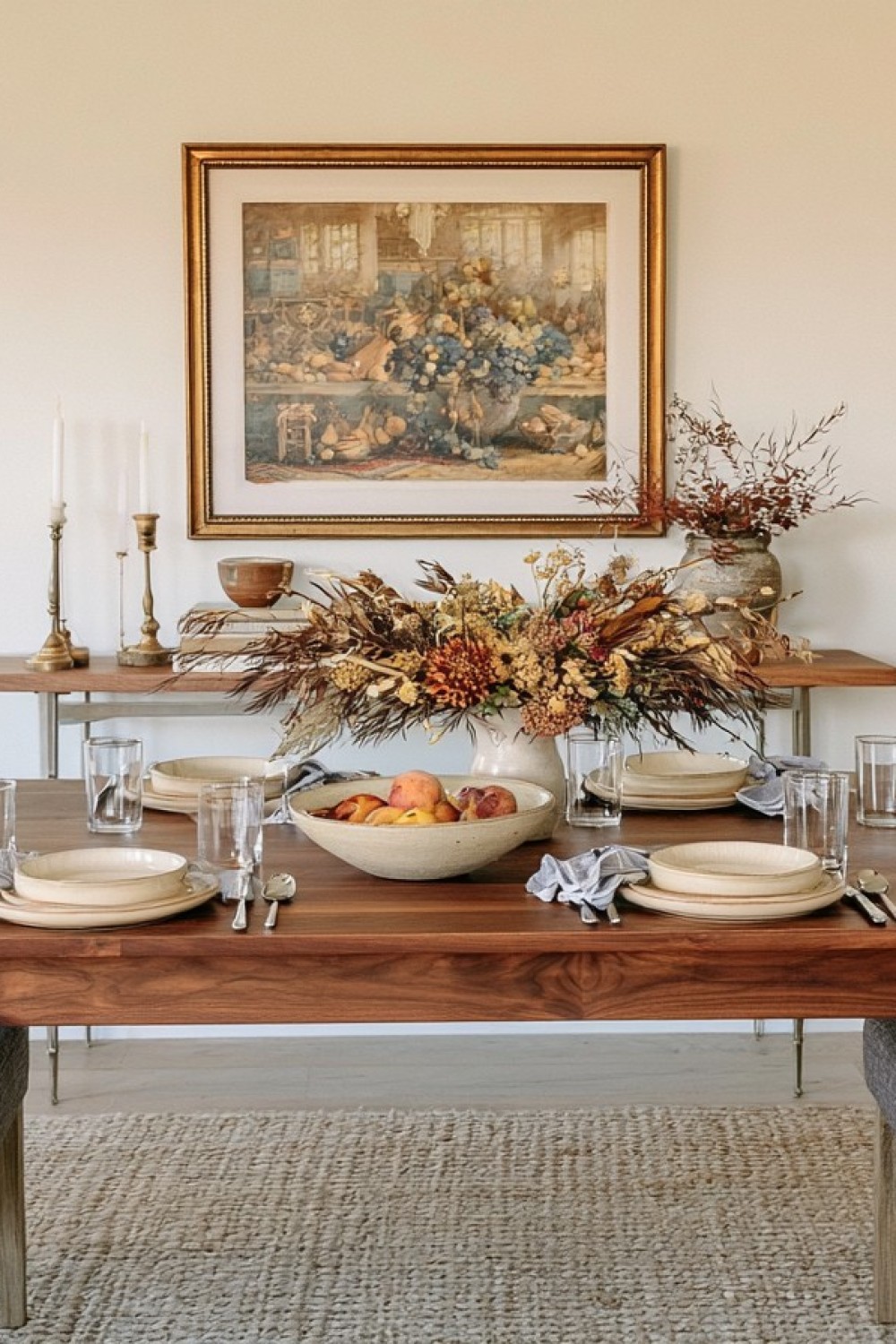 Proportional centerpiece arranged on a dining table with clear place settings