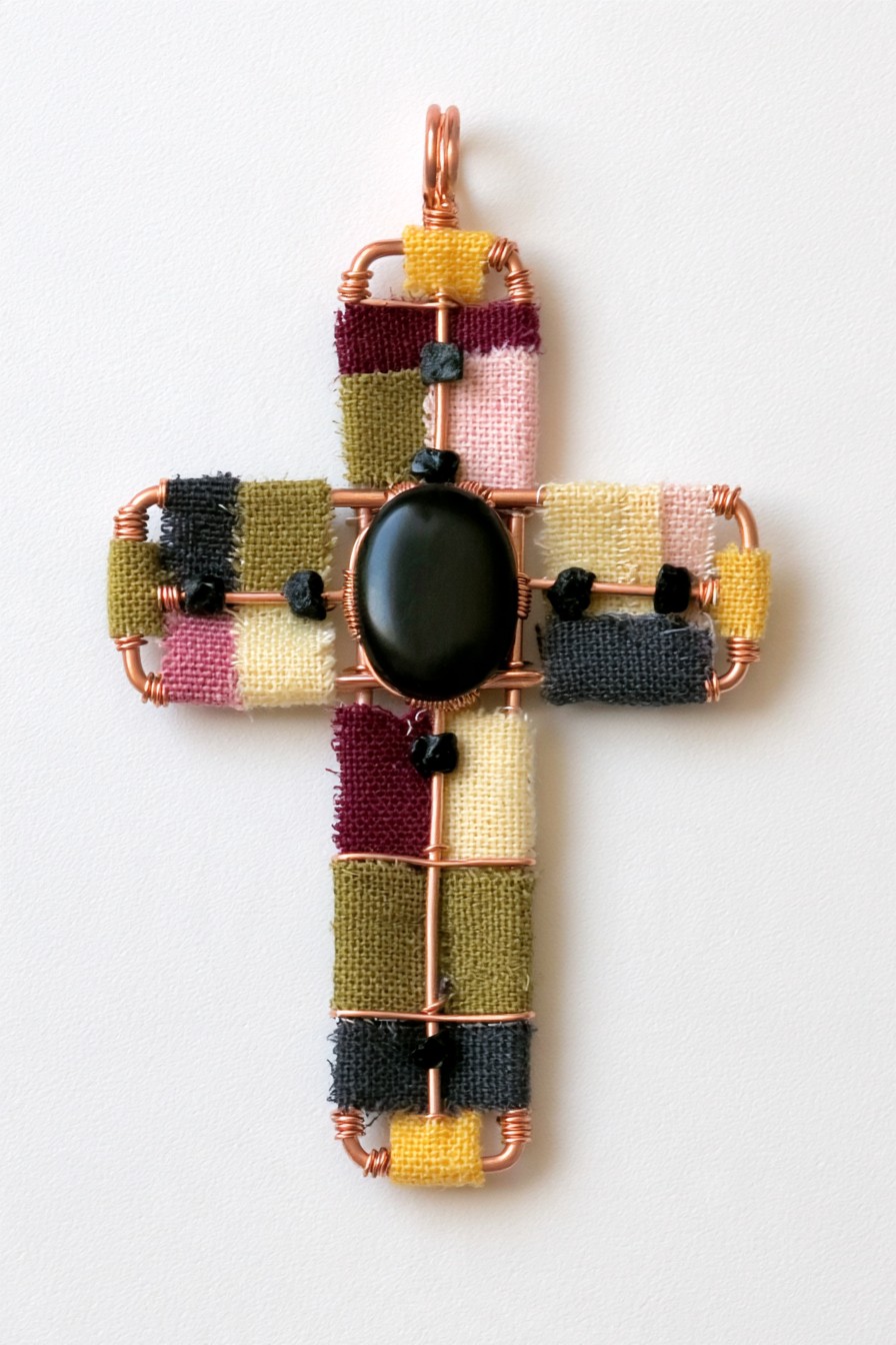 Patchwork fabric cross with copper wire and black cabochon
