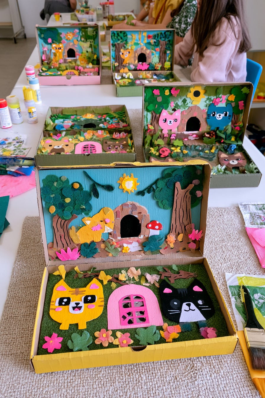 Shoebox animal diorama with layered scenery and handmade characters