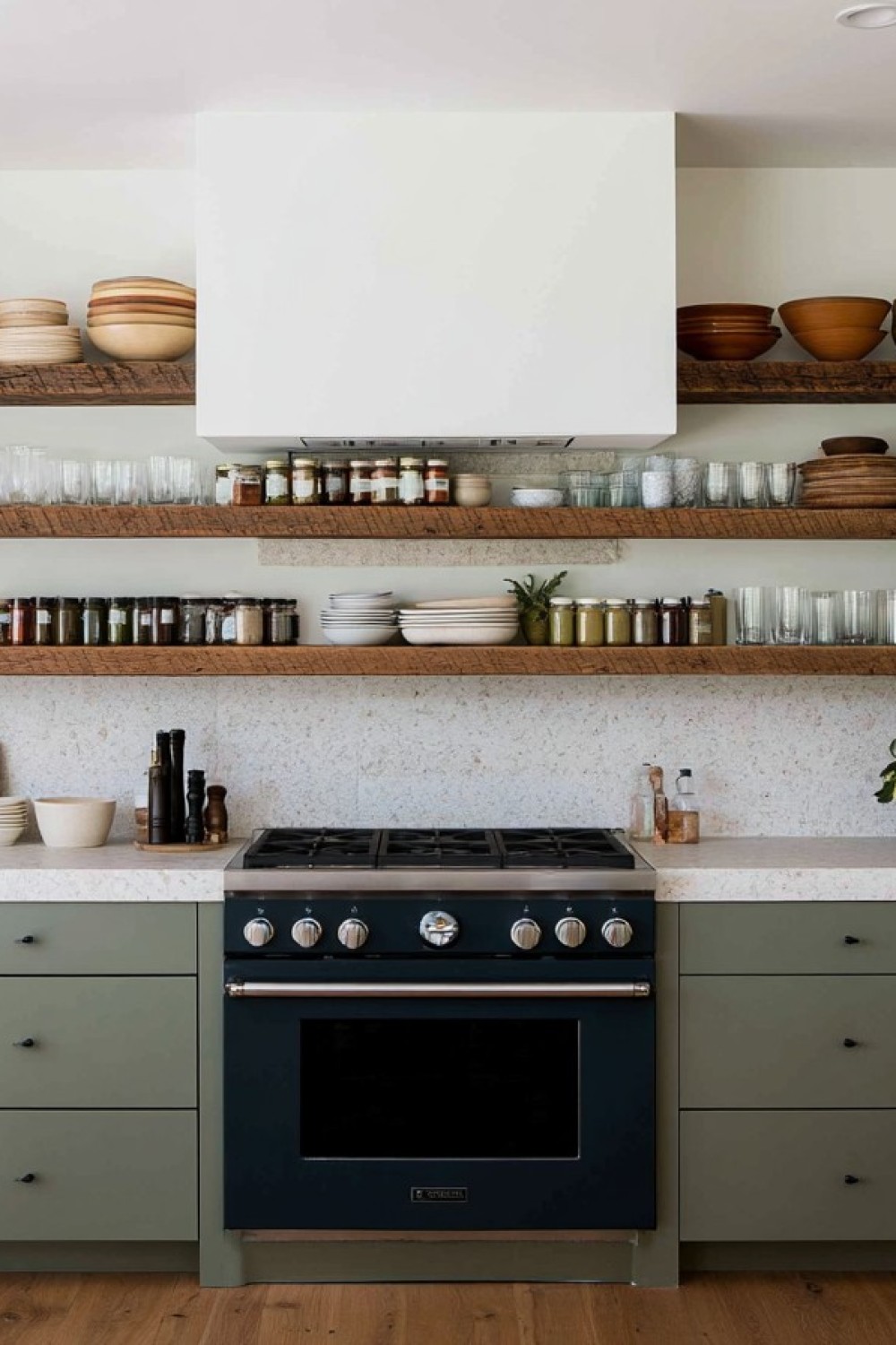 Kitchen shelves organizing frequently used dishes and ingredients
