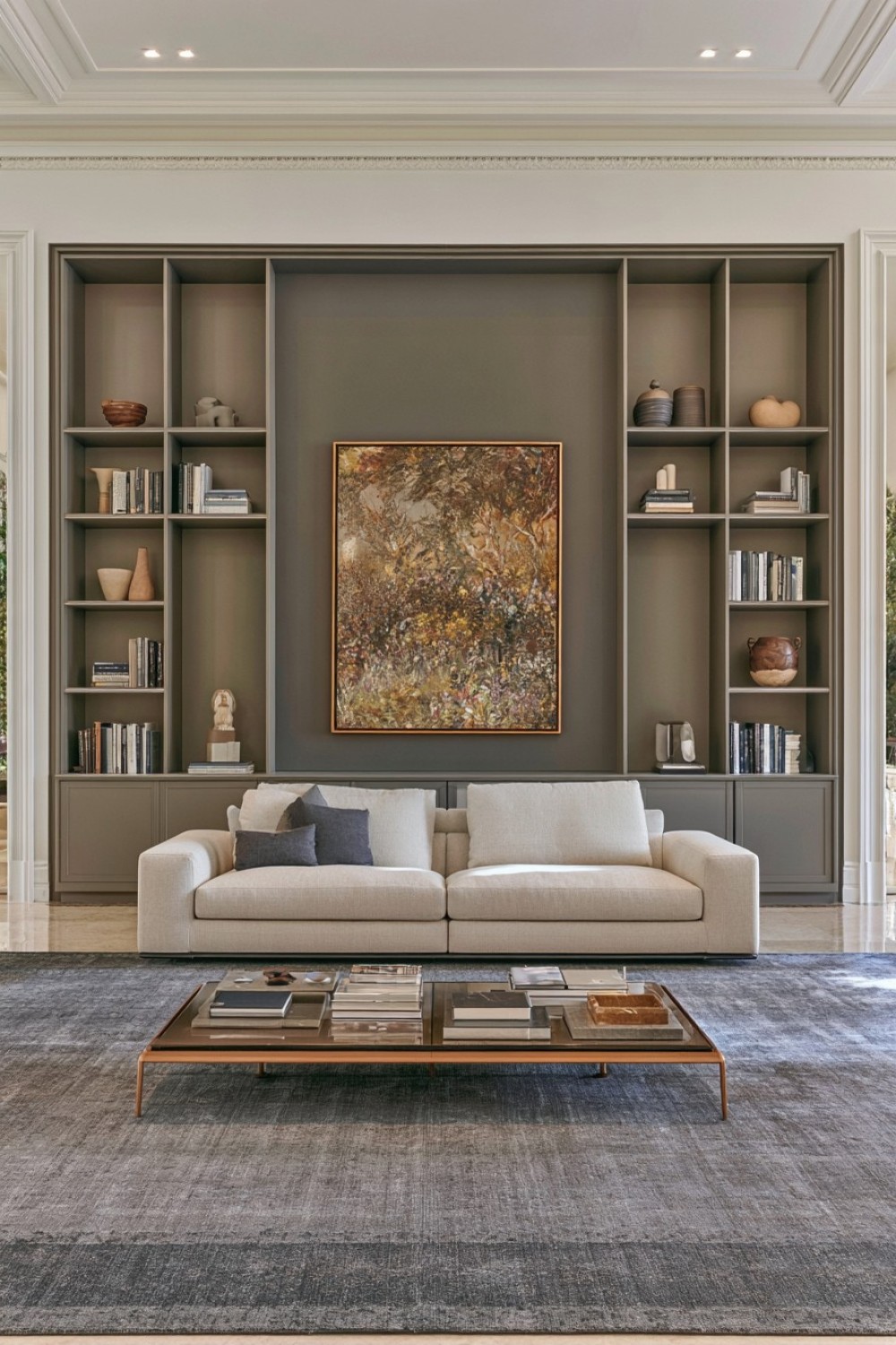 Living room sofa framed by practical built-in storage