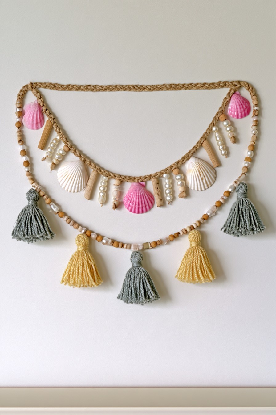Layered seashell garland with natural rope beads and yarn tassels