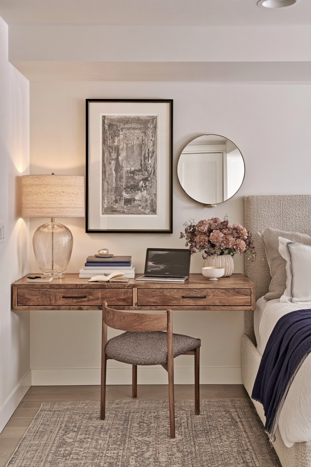 Small desk serving as a dressing table in a basement guest suite