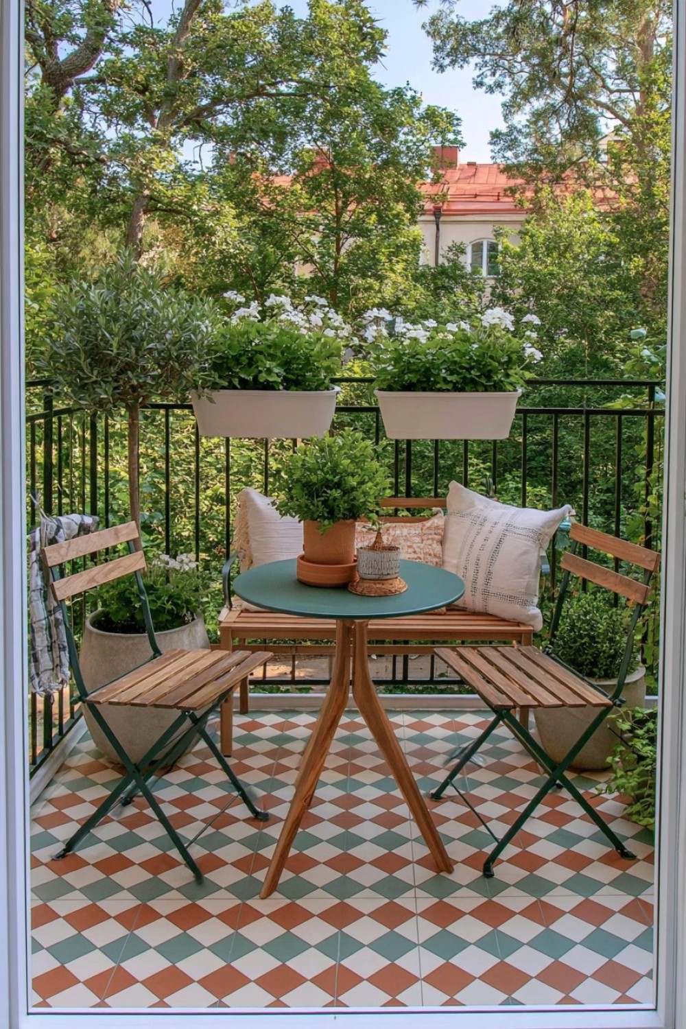 Balcony with graphic checkerboard flooring and simple furniture