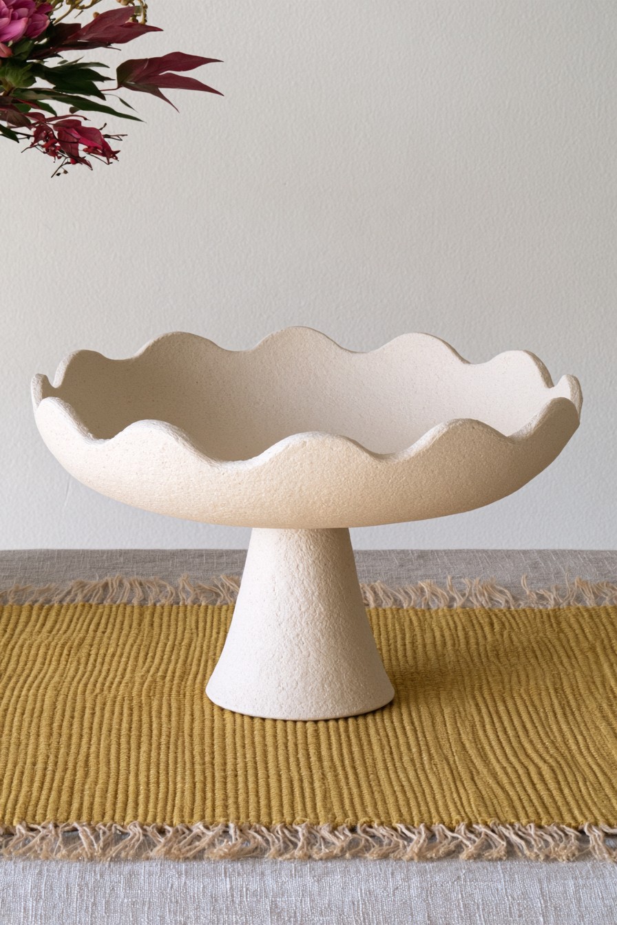 Organic pedestal air dry clay bowl with wavy edge