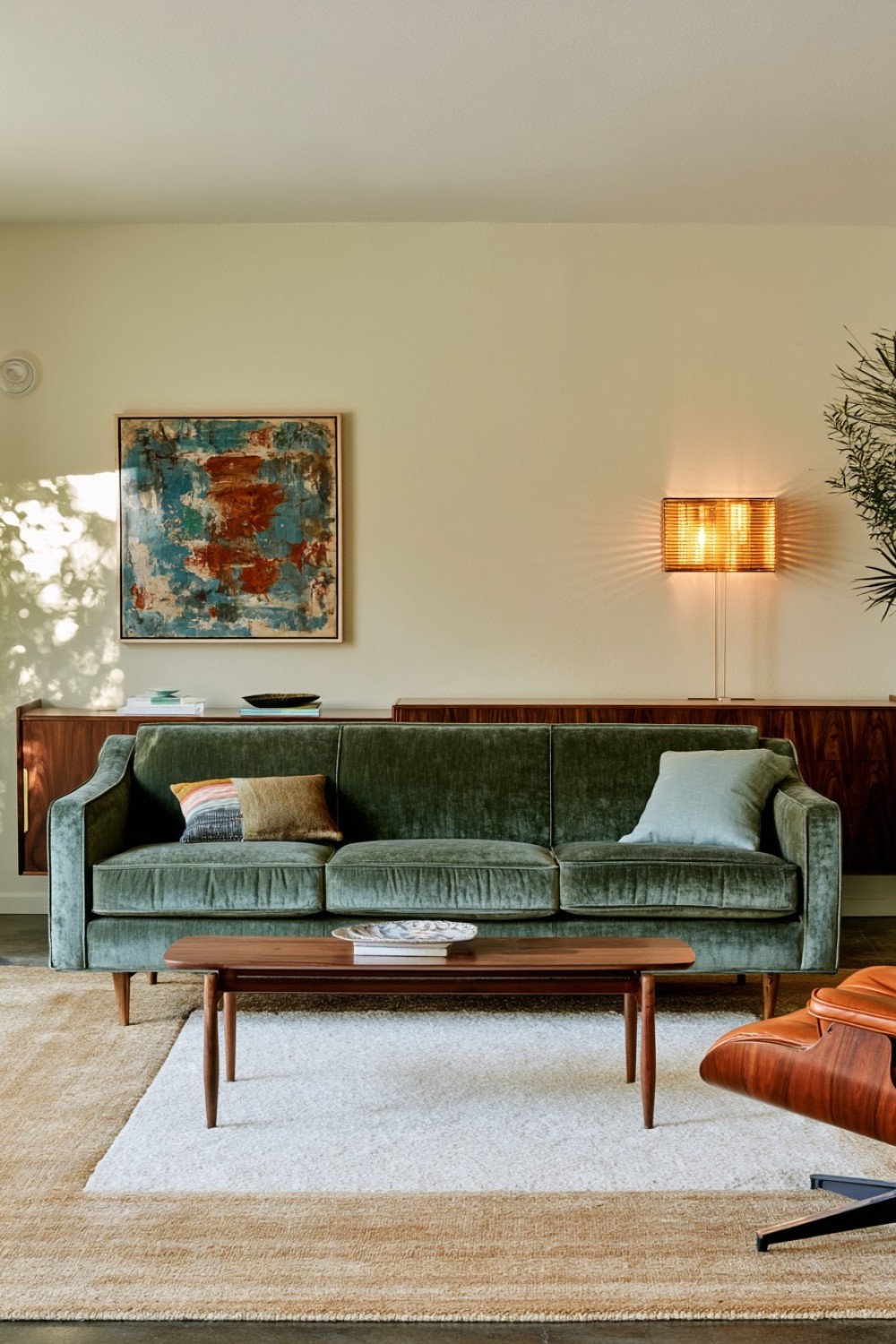 Muted blue and walnut mid-century modern living room