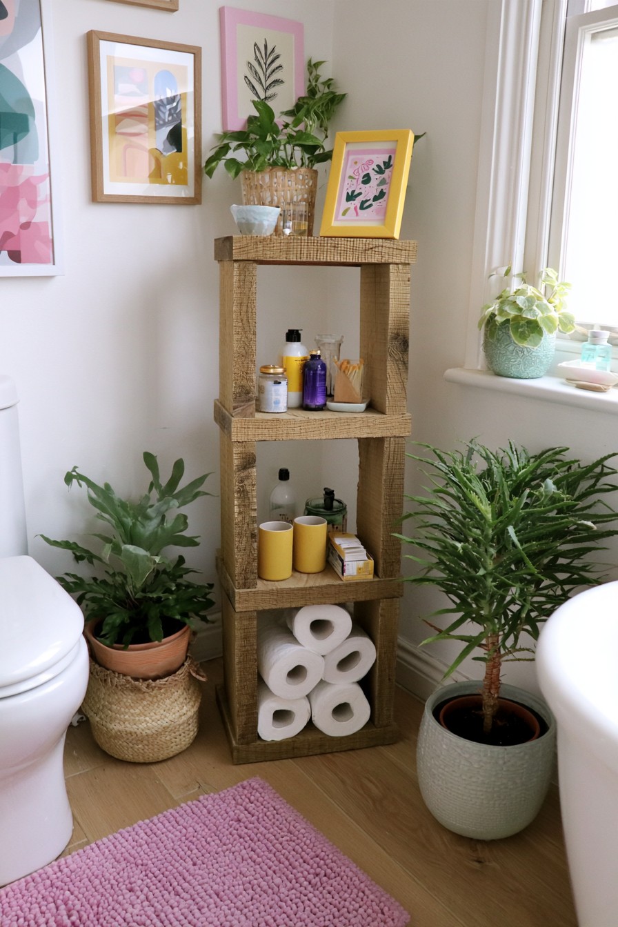 Tall wooden bathroom storage tower with open shelves
