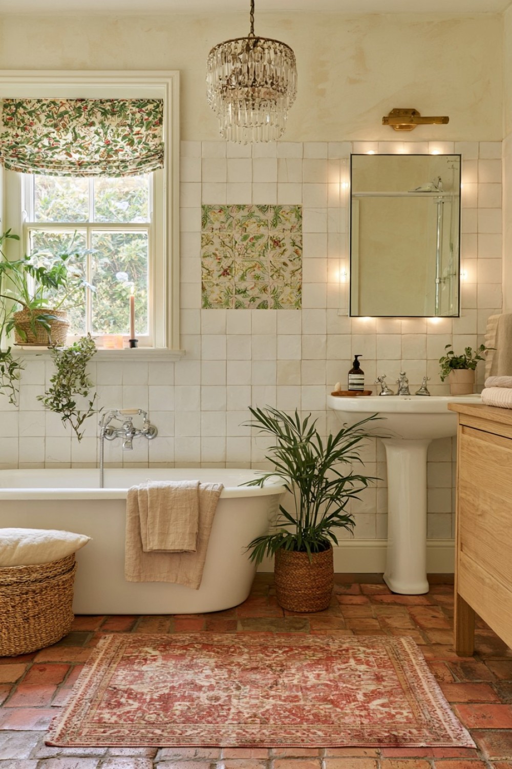 Terracotta bathroom flooring paired with crisp white fixtures