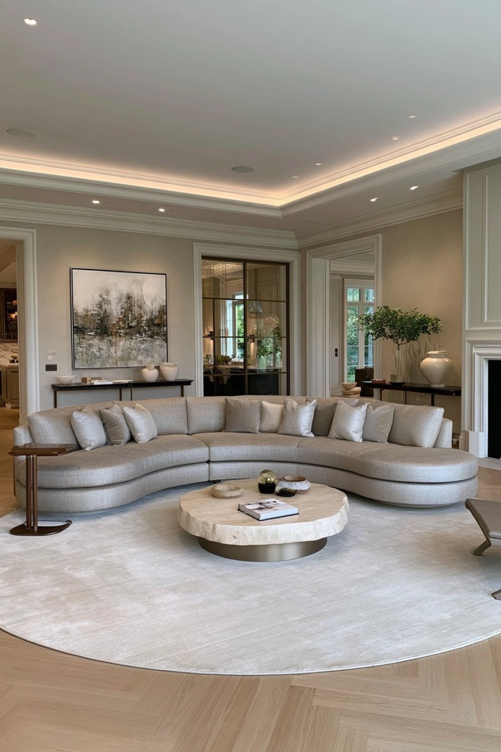 Deep curved sofa forming the architectural centerpiece of a living room