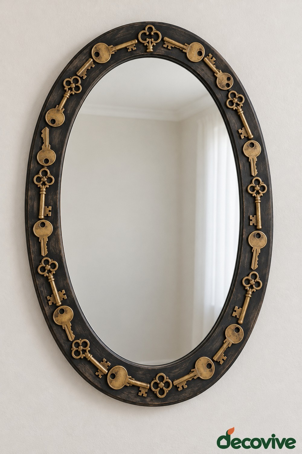 Charcoal oval mirror frame decorated with antique style brass colored keys