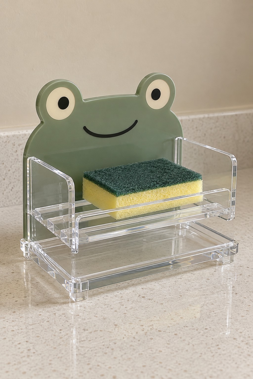 Sage frog acrylic sponge holder above a removable clear drip tray