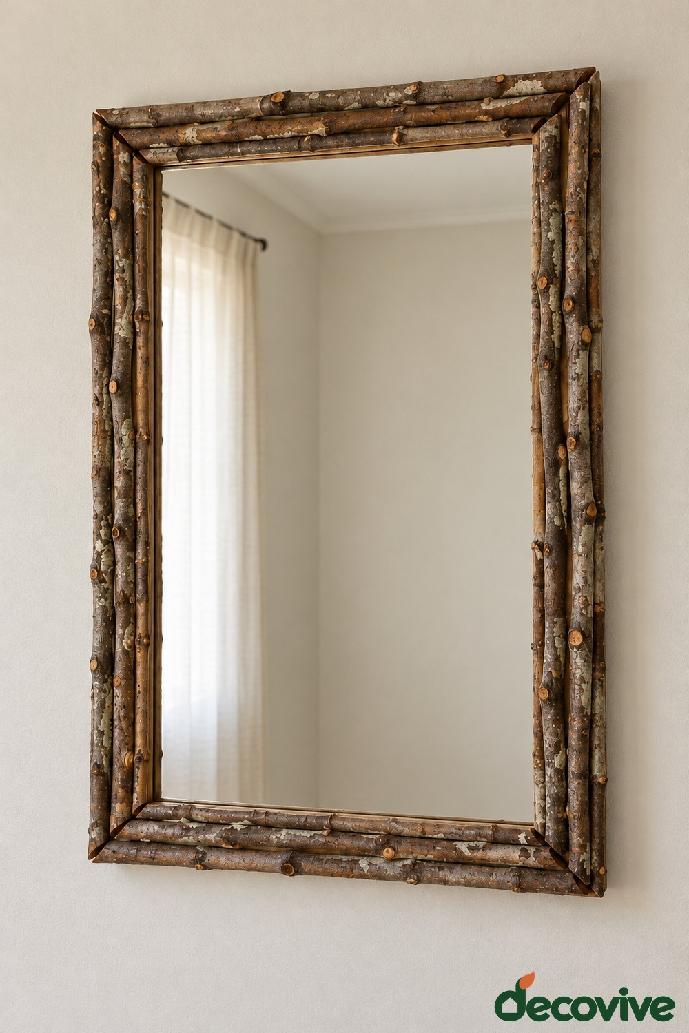 Rectangular mirror with a rustic border made from small natural branches