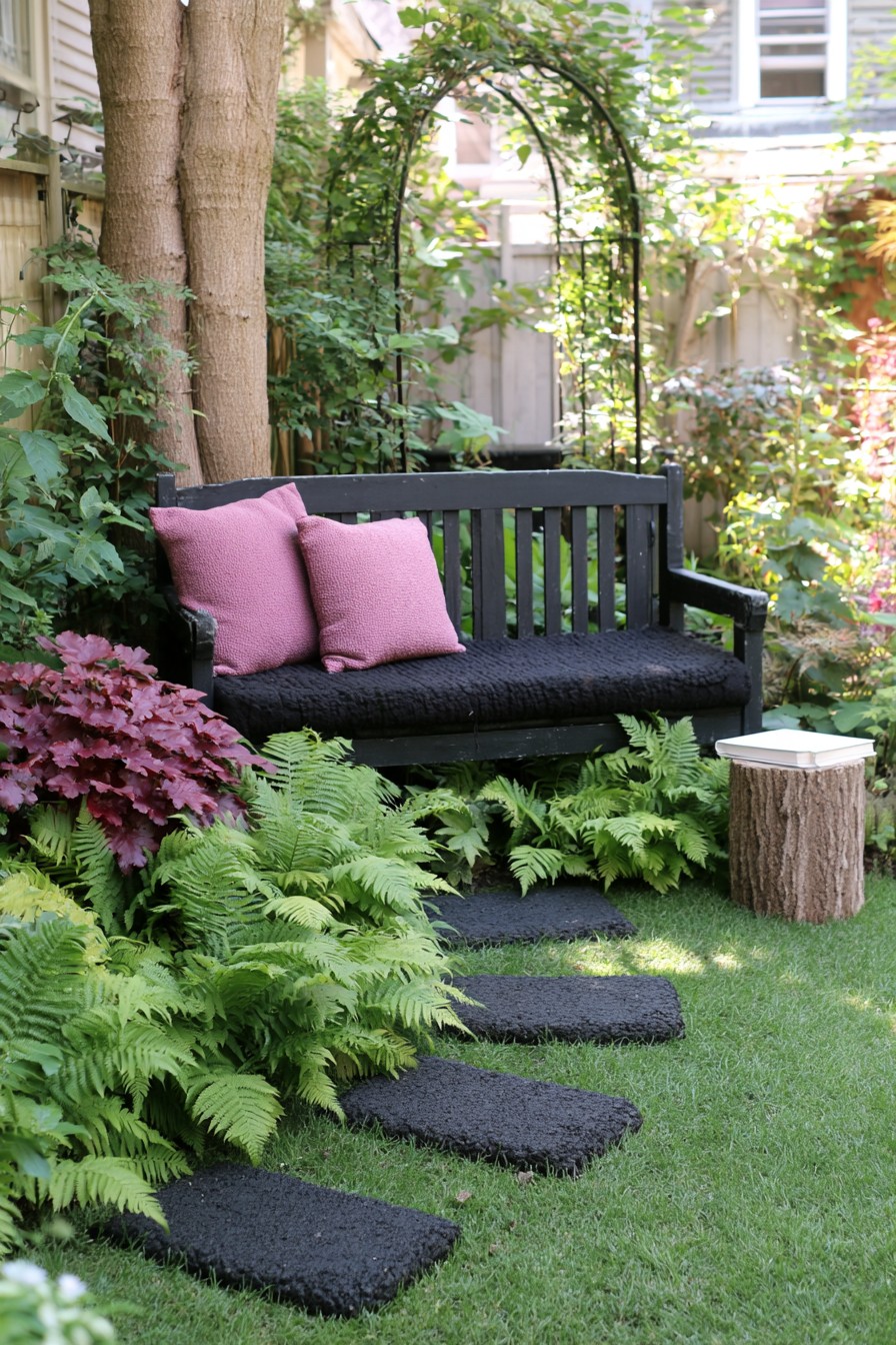 Woodland Gothic reading corner with black bench and stepping stones
