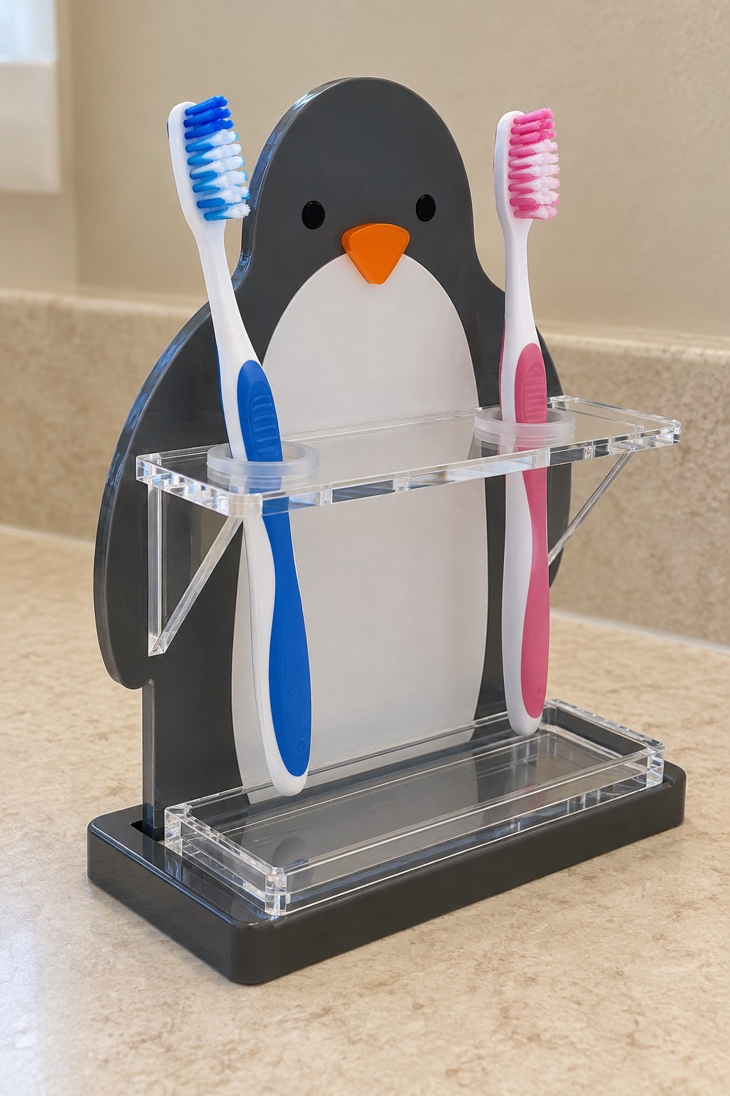 Penguin acrylic toothbrush stand with a clear raised support and rectangular base