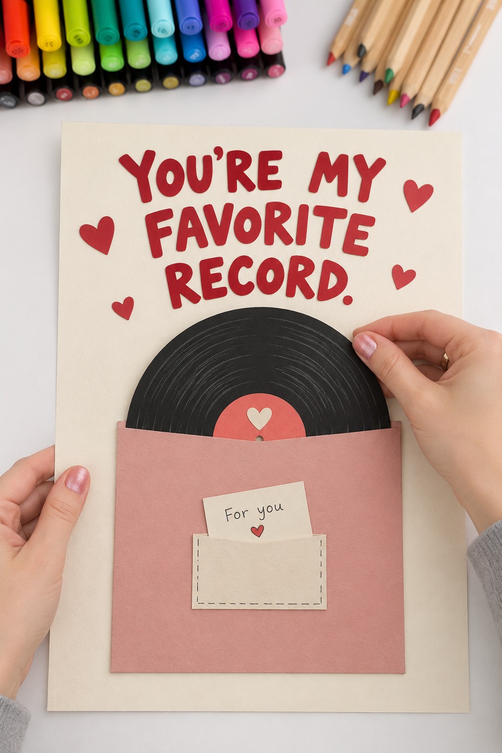 You Are My Favorite Record poster with a black paper disc inside a pink sleeve and a small cream note pocket