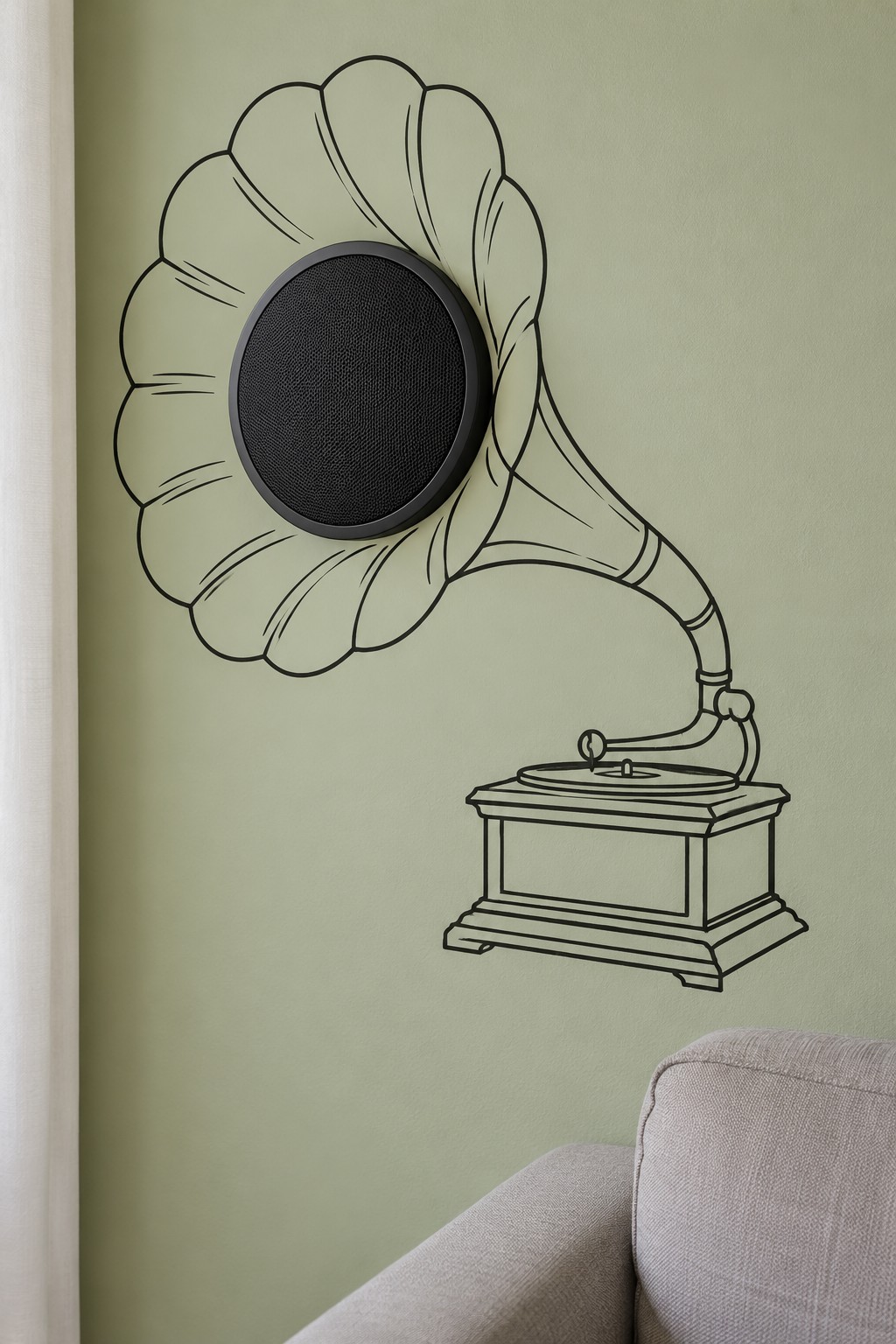 Round black speaker centered in a painted gramophone horn on a pale green wall