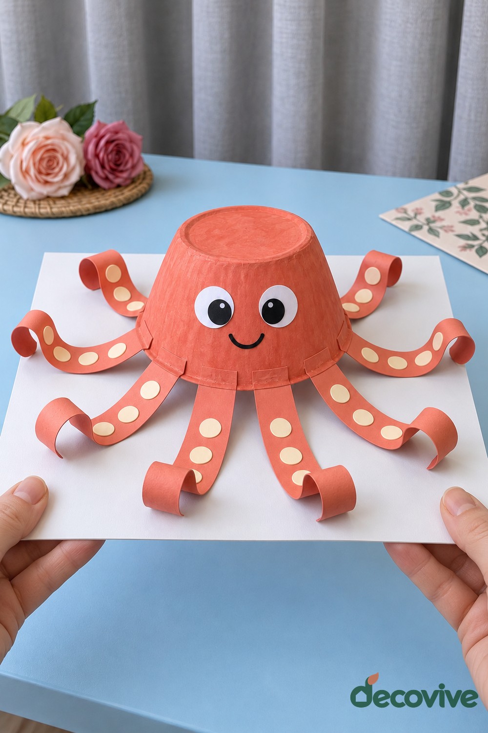 Finished paper bowl octopus with eight curled arms