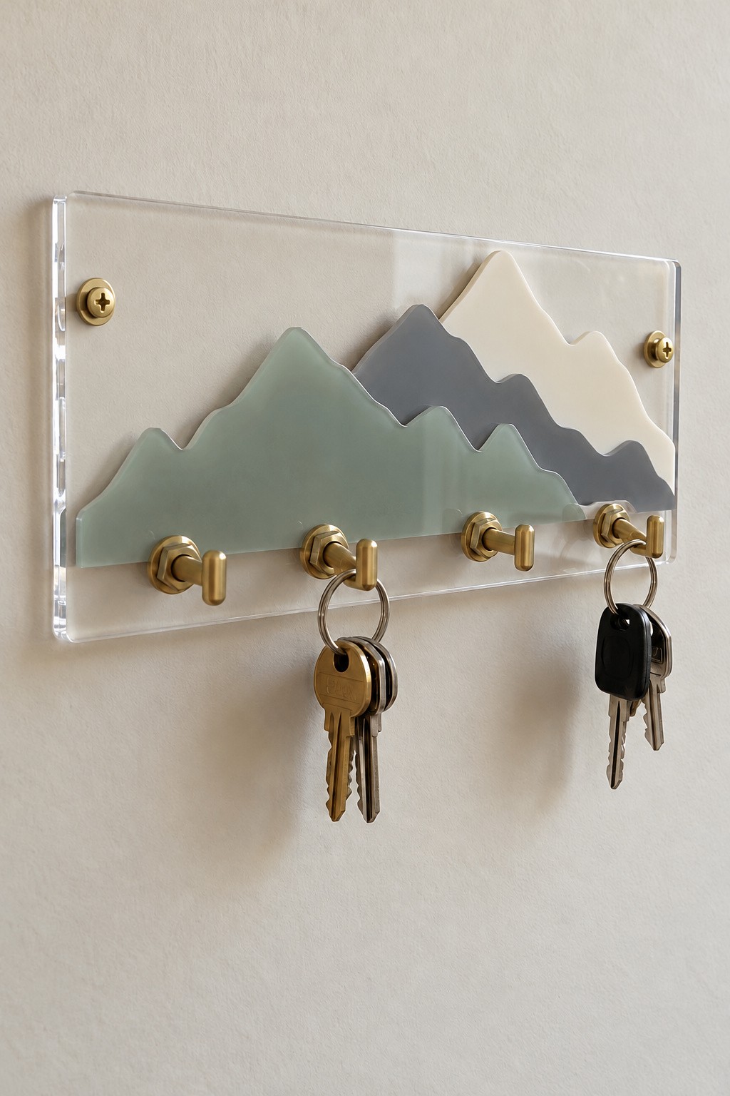 Layered green gray and cream acrylic mountain key rack with brass hooks