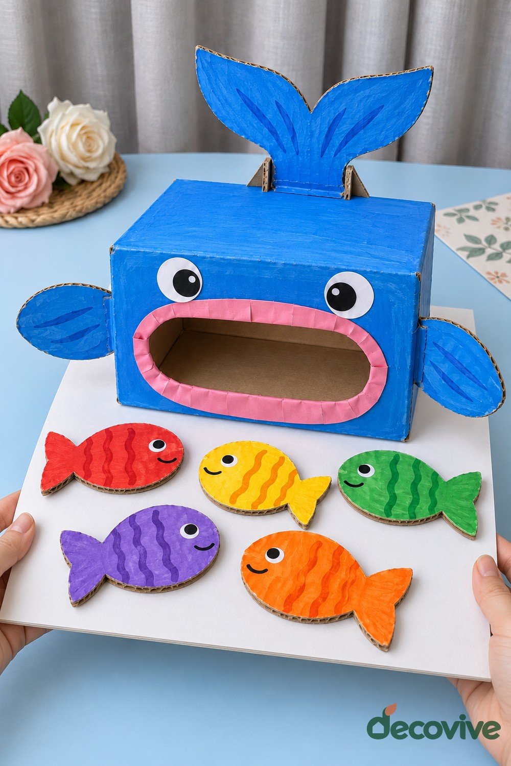 Finished cardboard whale feeding game